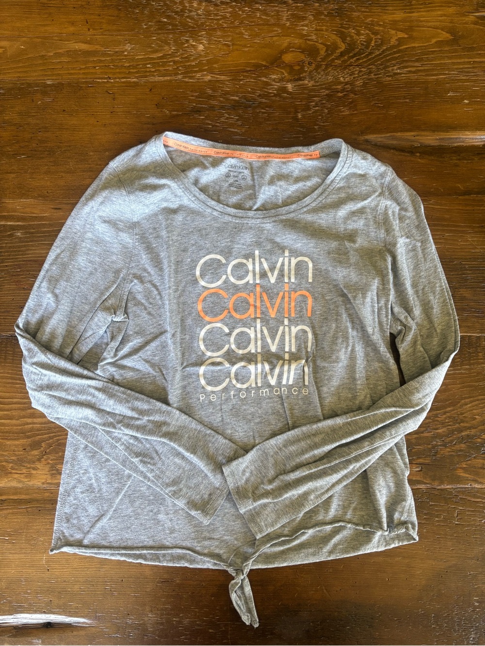 Women's Calvin Klein Long-Sleeve Gray Performance Top with White and Orange Logo